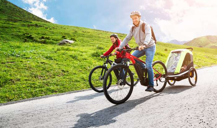 Von wegen, mit dem Fahrrad in den Urlaub zu fahren, kommt einer „Reise für Arme“ gleich!  ( Foto: Shutterstock -  Andrey_Popov  ) 